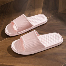 Load image into Gallery viewer, Non-slip rhombus striped indoor slippers for men and women in pink.
