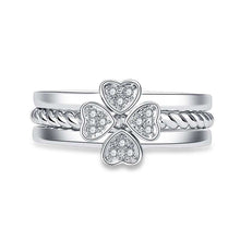 Load image into Gallery viewer, Adjustable four-leaf clover ring with spinning design and zircon embellishments in white gold.
