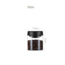 Load image into Gallery viewer, 500ml vacuum sealed glass canister with black lid containing coffee beans, 10.5cm wide,
