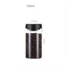 Load image into Gallery viewer, Glass airtight canister with black lid, filled with coffee beans, 1200ml capacity, 18cm height, 10.5cm diameter, ideal for kitchen storage.
